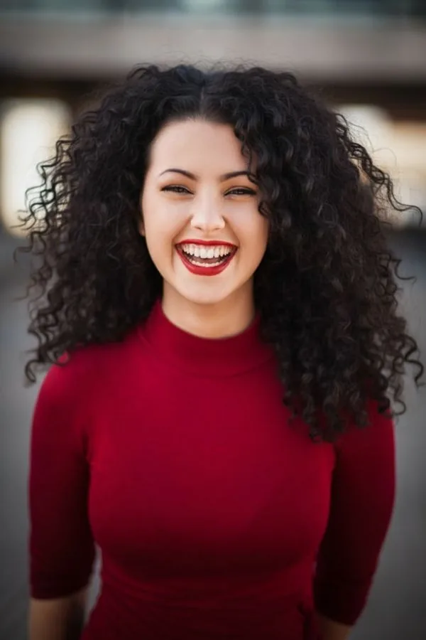 AI hairstyle result: dramatic voluminous curls